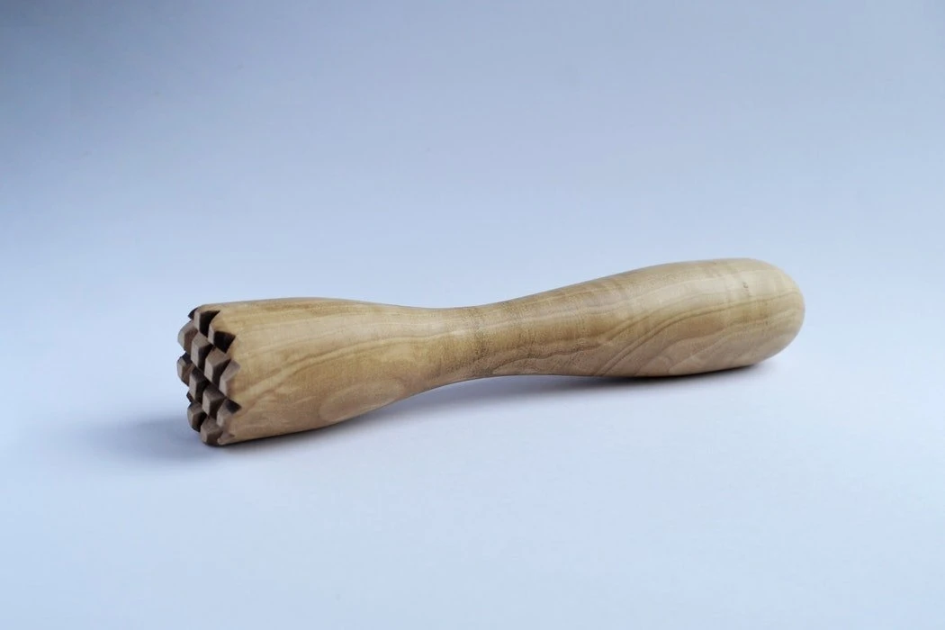 Ein Holzmuddler
